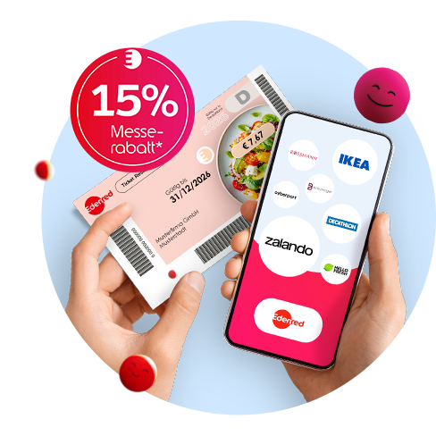 Zwei Hände halten vor hellblauem Hintergrund einen rosa Edenred Ticket Restaurant-Gutschein sowie ein Smartphone, das in der Edenred-App Partnerlogos wie IKEA, Rossmann, Zalando, Decathlon und HelloFresh anzeigt. Links oben schwebt ein roter Kreis mit weißem Schriftzug „15 % Messerabatt*“, auf dem Bild verteilen sich mehrere rote, lachende Emoji-Kugeln.